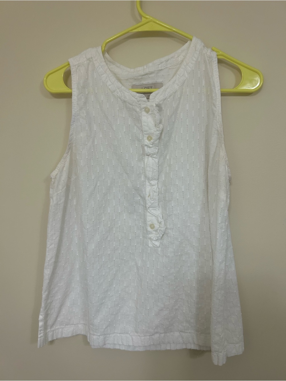 Sleeveless ruffle blouse